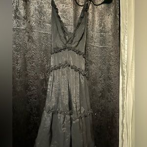 Black frilly cris cross strap dress! Feel free to ask for a better picture!